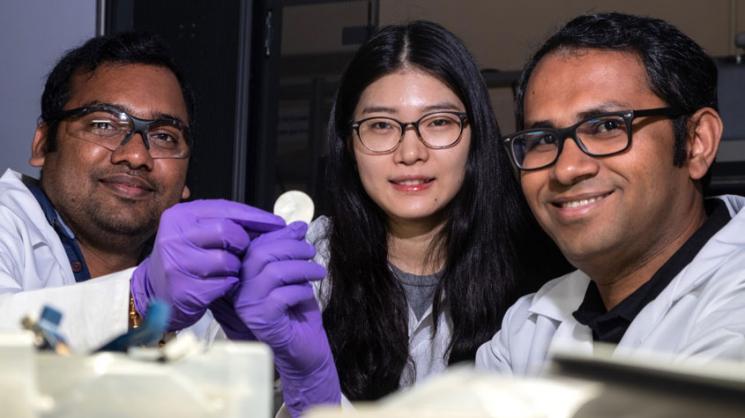 From left, postdoctoral researcher Anand Puthirath, academic visitor Fanshu Yuan and research scientist M.M. Rahman show the high-temperature flexible dielectric material invented at Rice University. The three are among authors of a paper in Advanced Func